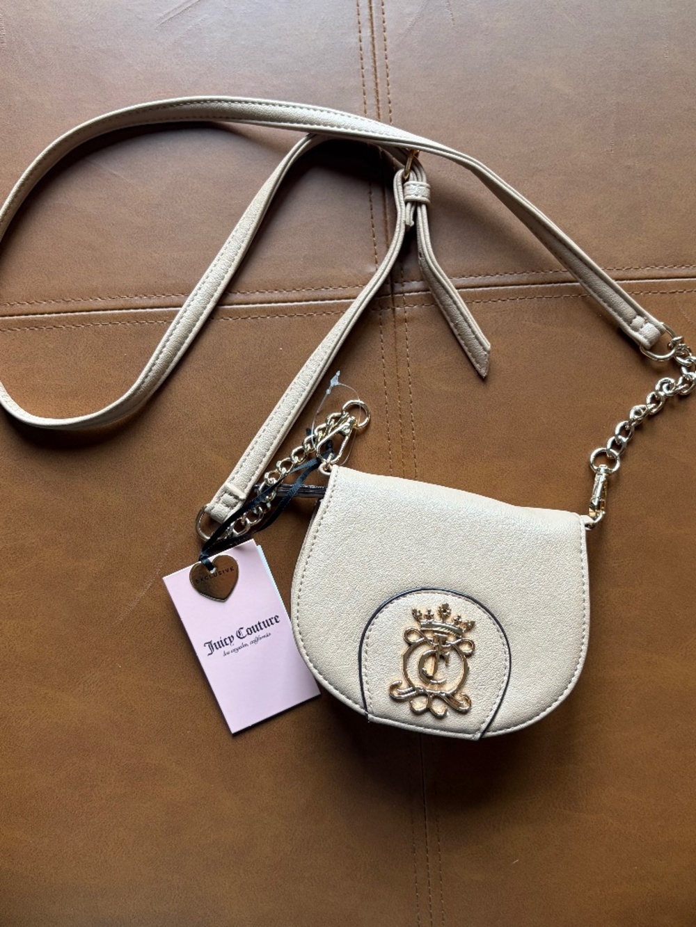 Juicy Couture Royal Crest Mini Rounded Flap Crossbody Bag Cream